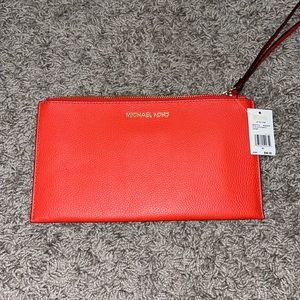 Brand new Michael kors clutch